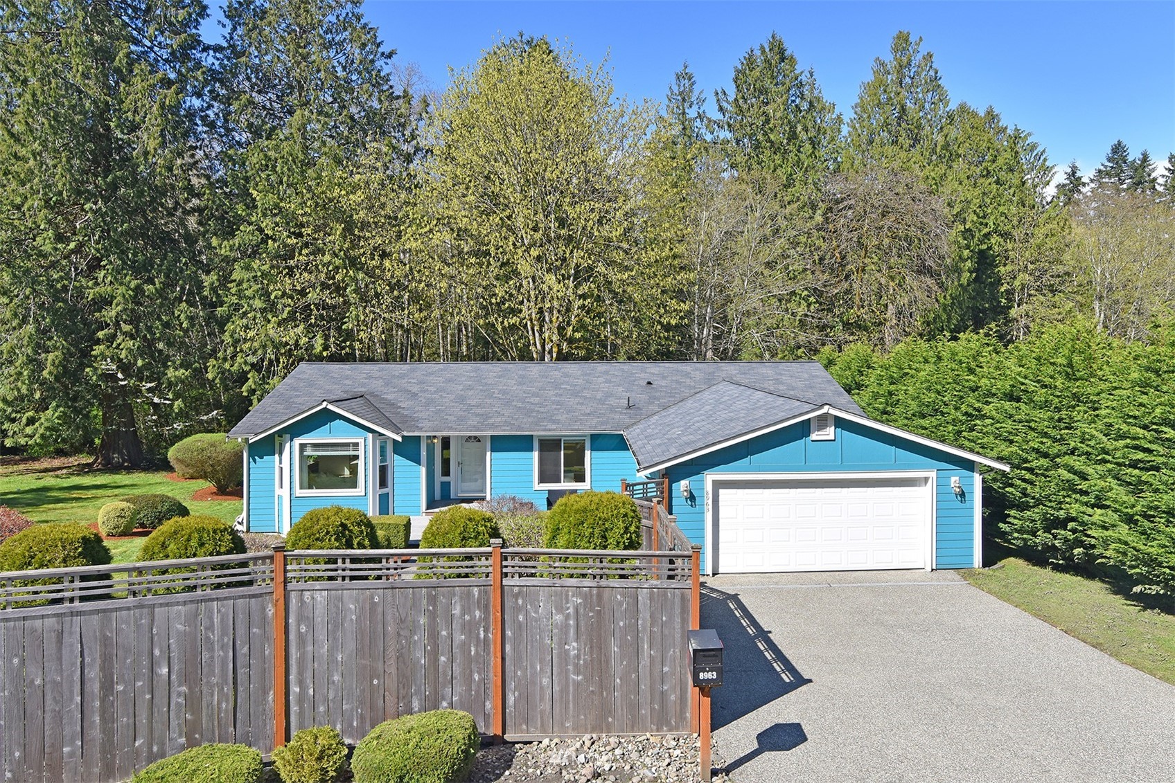 8963 Miller Road Northeast Bainbridge Island, WA 98110 - Photo 1 of 35 a view of house with outdoor space and sitting area