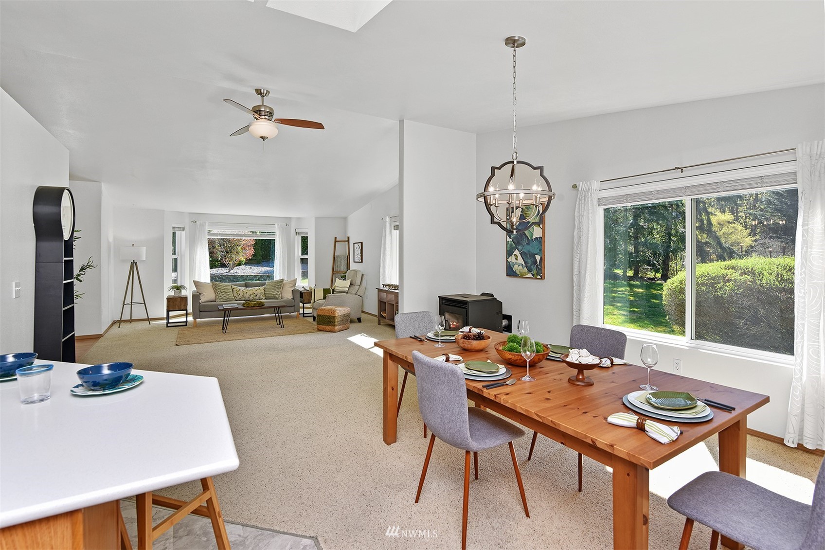 8963 Miller Road Northeast Bainbridge Island, WA 98110 - Photo 12 of 35 a view of a dining room with furniture window and outside view