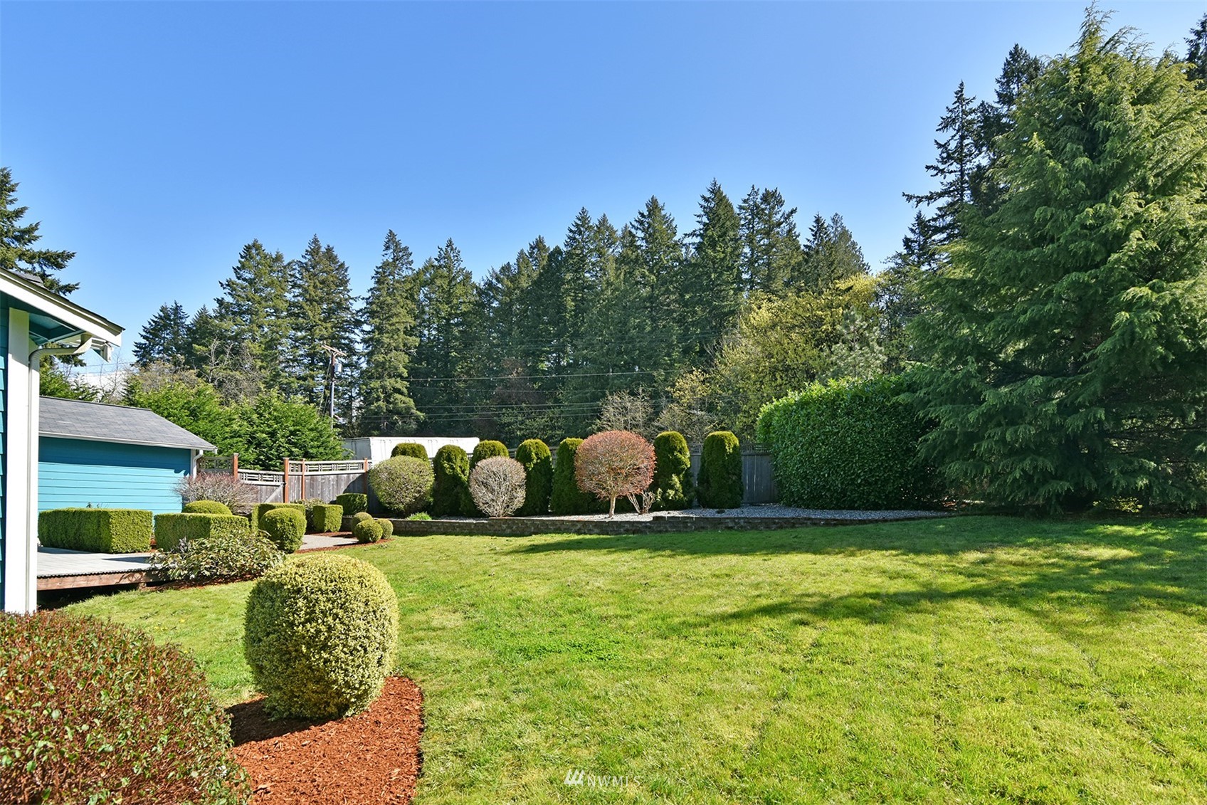 8963 Miller Road Northeast Bainbridge Island, WA 98110 - Photo 5 of 35 a view of a garden area