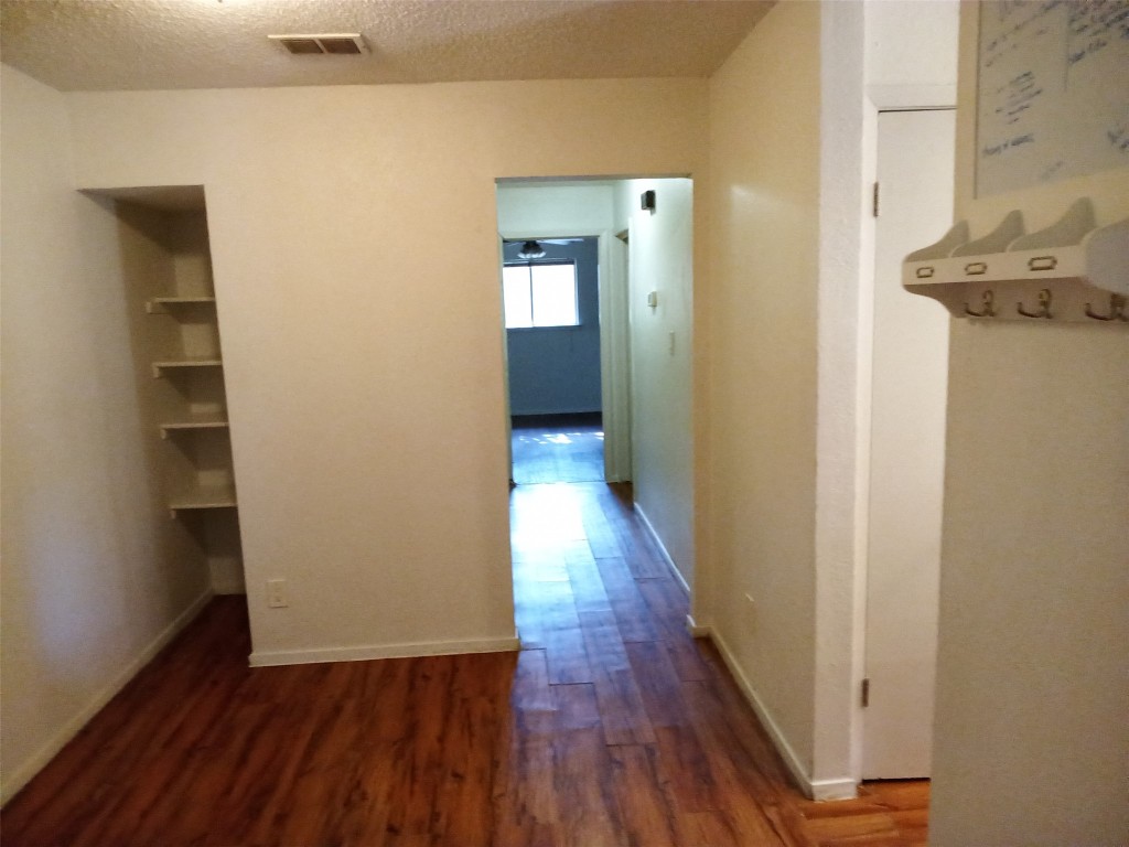 907 B Sirocco Drive Austin, TX 78745 - Photo 10 of 20 wooden floor in a gallery