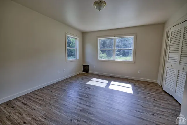 a view of a city with a lake