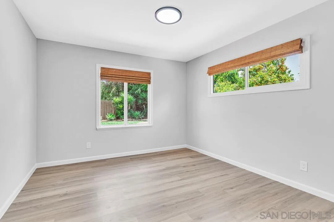 12208 Witt Road Poway, CA 92064 - Photo 23 of 43 wooden floor in an empty room with a window