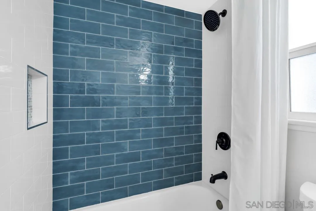 12208 Witt Road Poway, CA 92064 - Photo 27 of 43 a bathroom with a bathtub and a shower