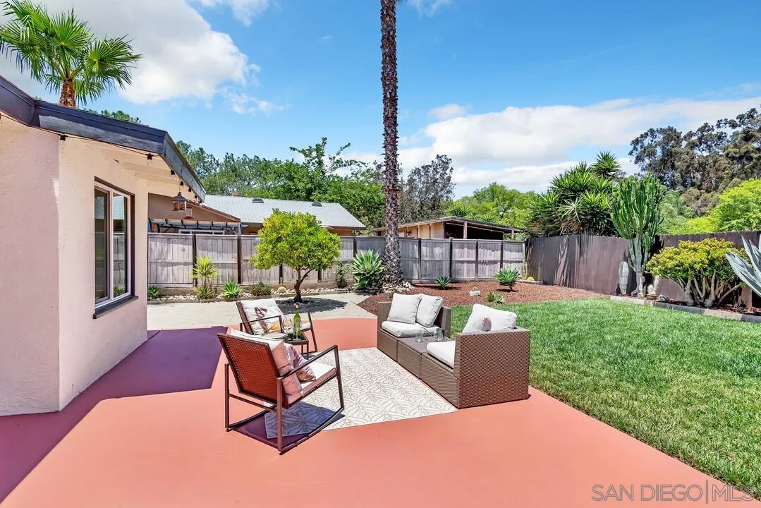 12208 Witt Road Poway, CA 92064 - Photo 29 of 43 a view of a patio with couches chairs and a table and chairs
