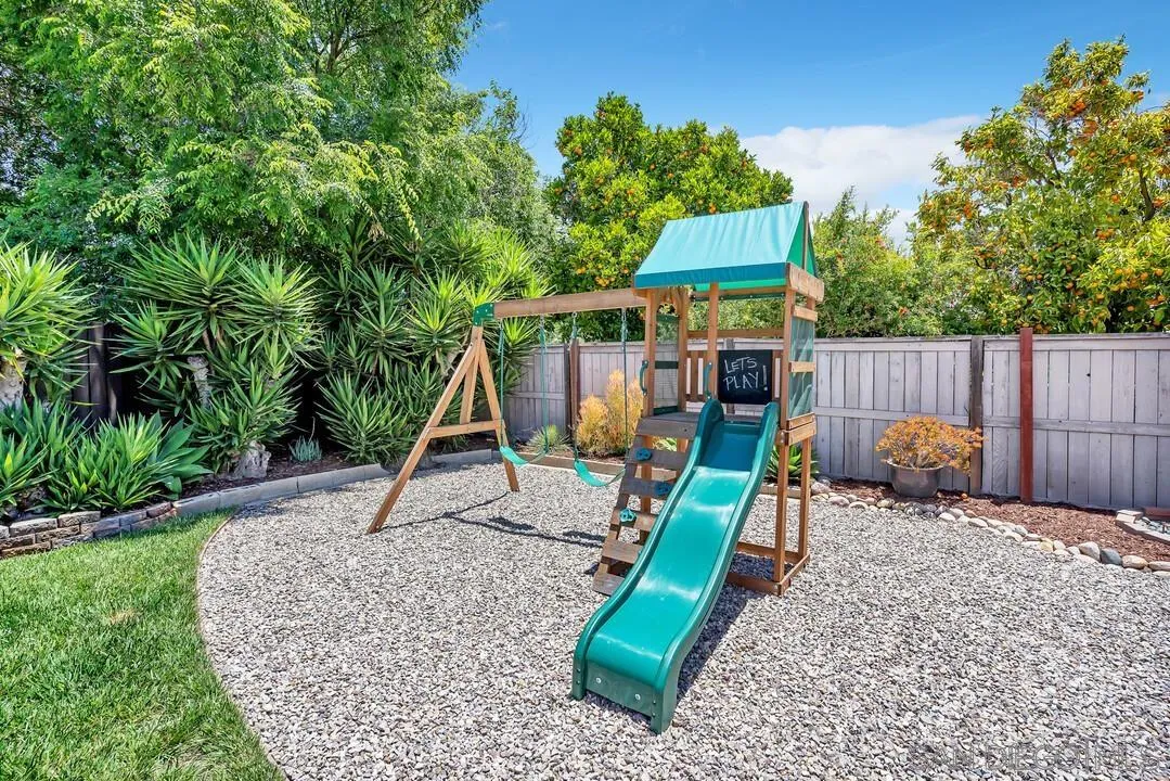 12208 Witt Road Poway, CA 92064 - Photo 34 of 43 a view of a backyard with a slide