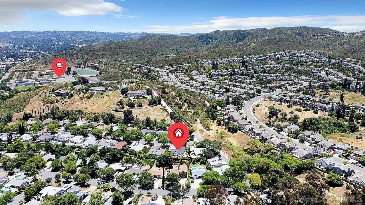 12208 Witt Road Poway, CA 92064 - Photo 39 of 43 an aerial view of a houses with a lush green hillside