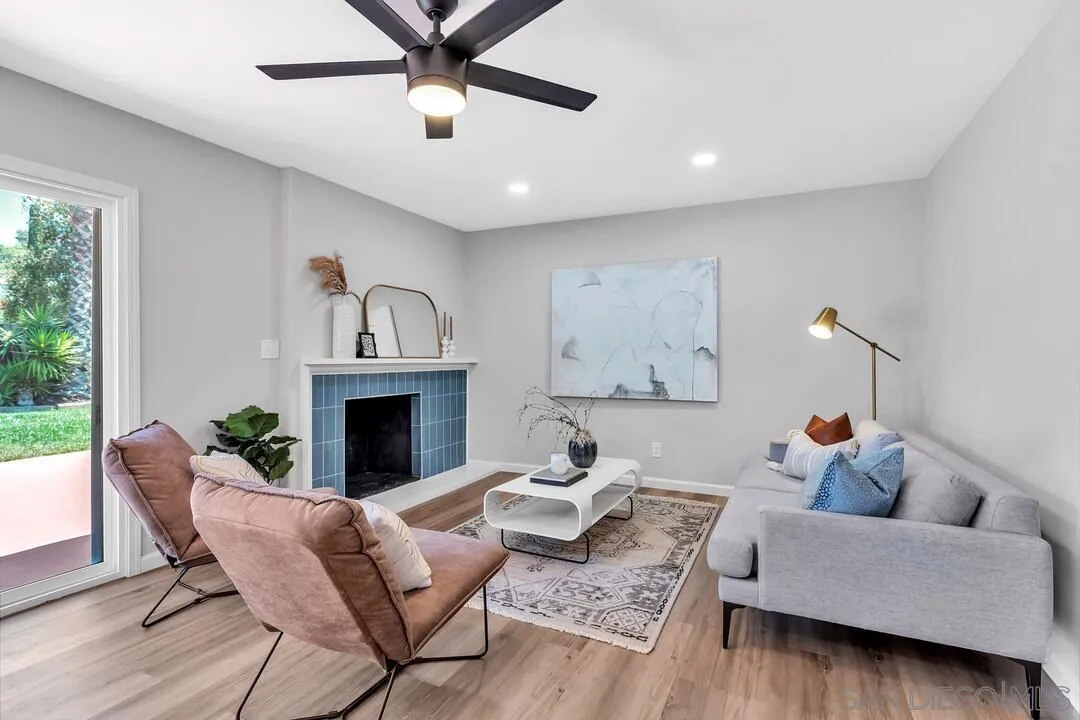 12208 Witt Road Poway, CA 92064 - Photo 5 of 43 a living room with furniture a fireplace and a window