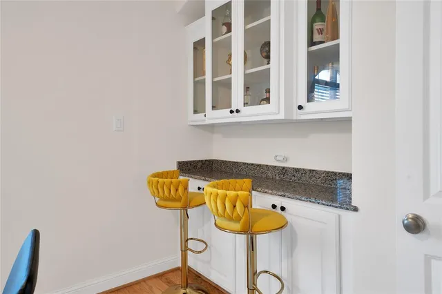 a bedroom with a bed and a fireplace