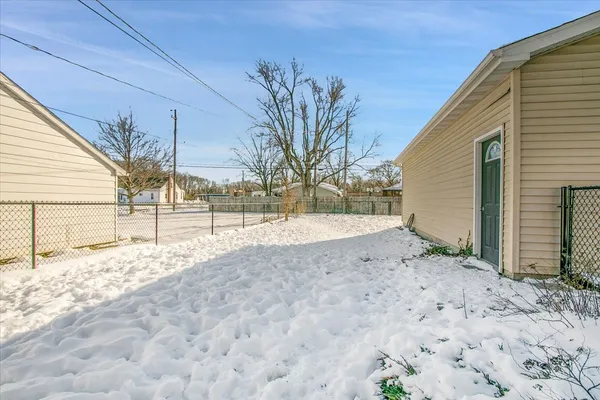 a view of a house with a snow