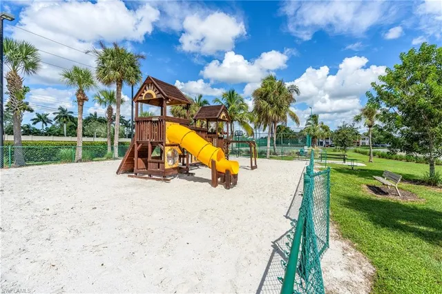 an aerial view of a house with swimming pool garden and patio