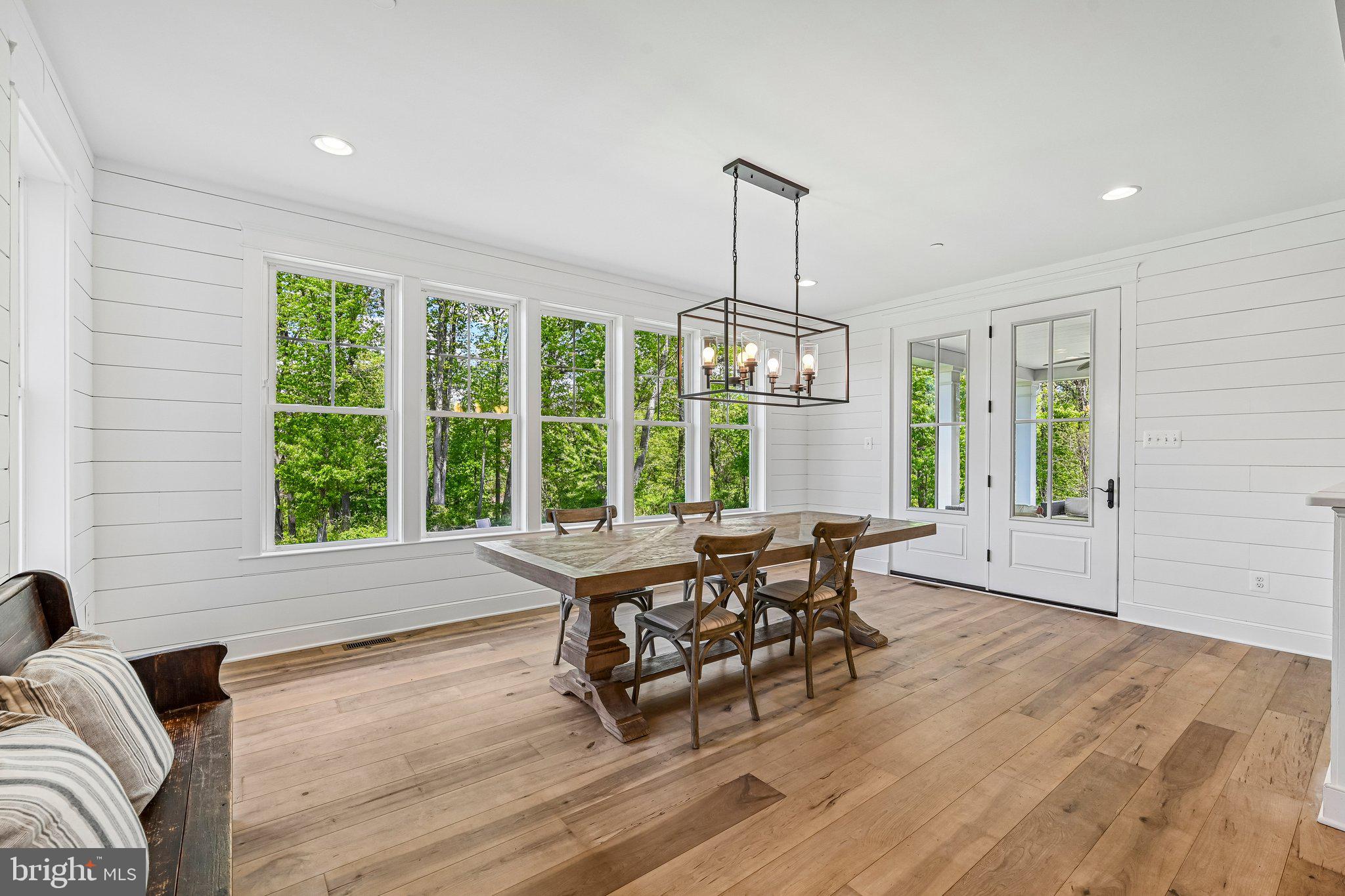 14516 Old Frederick Road Cooksville, MD 21723 - Photo 23 of 100 a living room with furniture and floor to ceiling windows