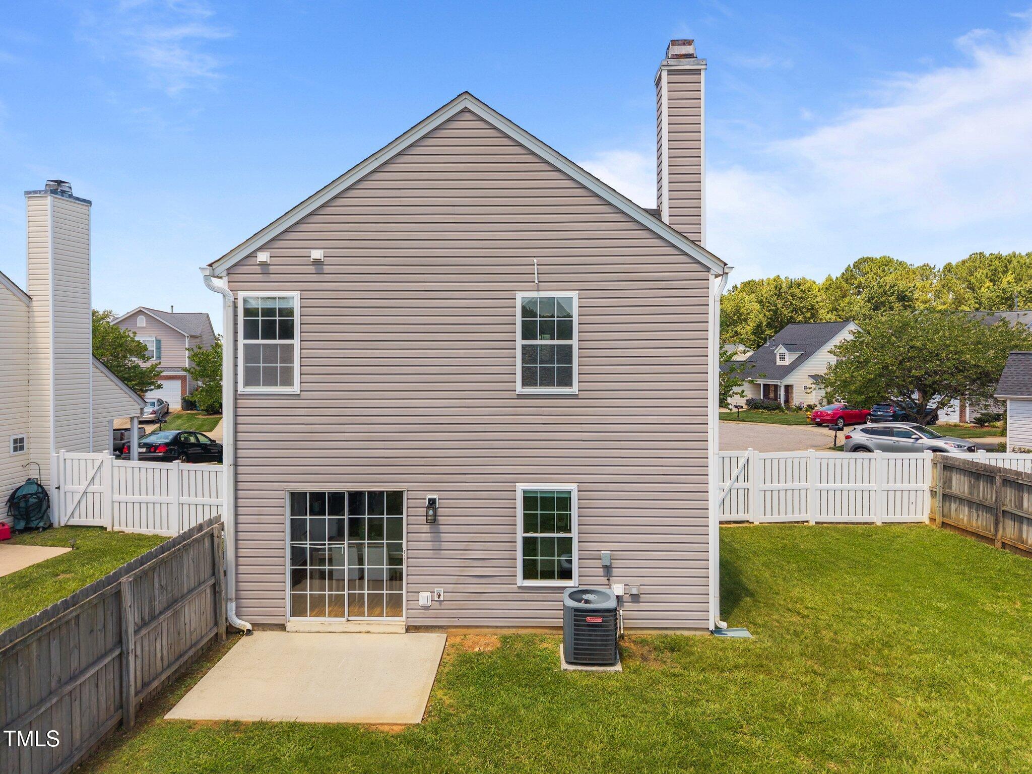 5300 Roan Mountain Place Raleigh, NC 27613 - Photo 23 of 27 a front view of house with yard