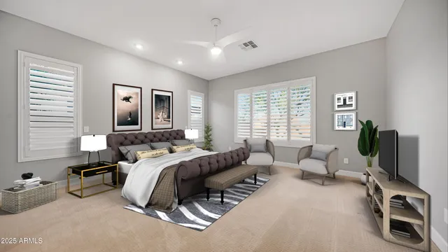 a spacious bedroom with a bed and flat screen tv