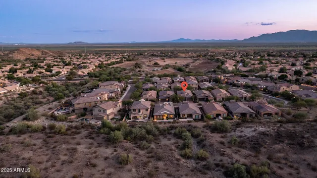 a city view with mountains in the background