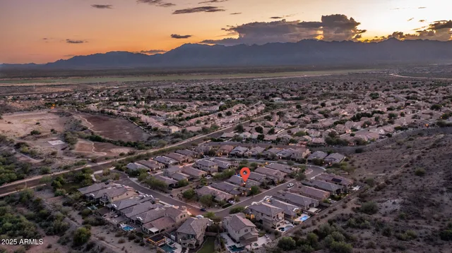 a view of a swimming pool an outdoor seating swimming pool and mountain view
