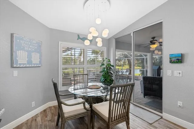 a living room with fireplace furniture and a flat screen tv