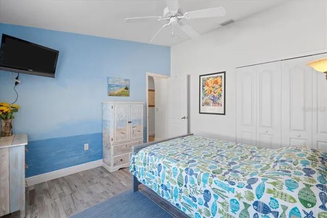 a bed room with a bed and a couch