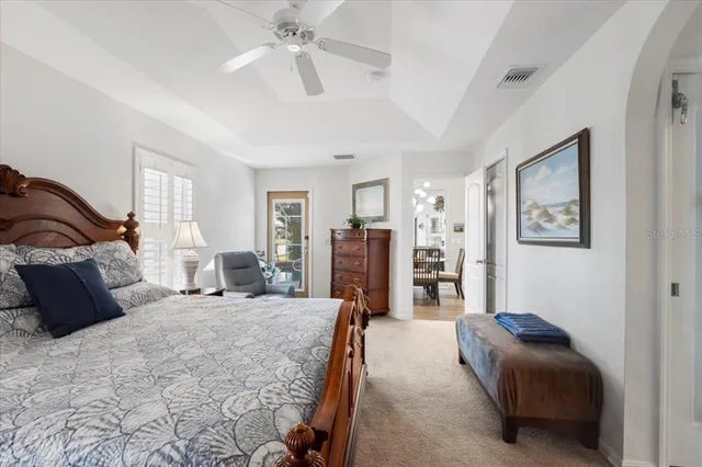 a bathroom with a granite countertop sink mirror and bathtub