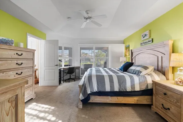a bathroom with a tub a sink and mirror