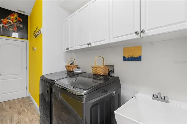 a view of a swimming pool with seating area