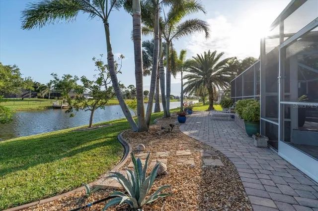 an aerial view of residential building and lake