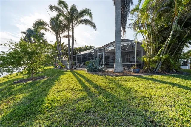 an aerial view of a house with a swimming pool