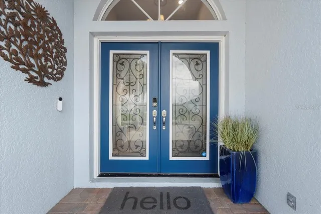 a view of entryway with wooden floor