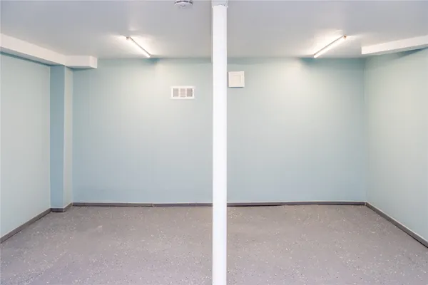 a swimming pool with outdoor seating and yard in back