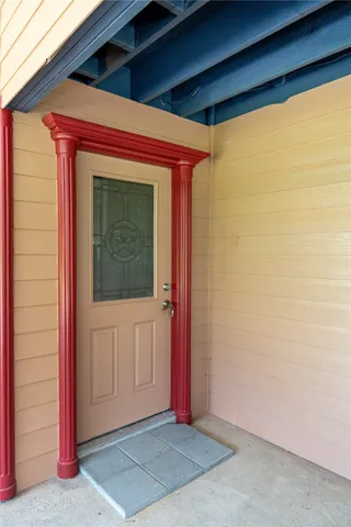 a kitchen with stainless steel appliances granite countertop a sink and a stove