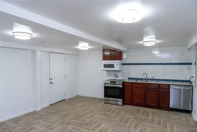 a hallway with cabinets