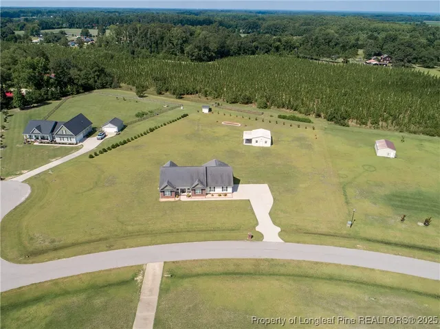 a view of a lake with a yard