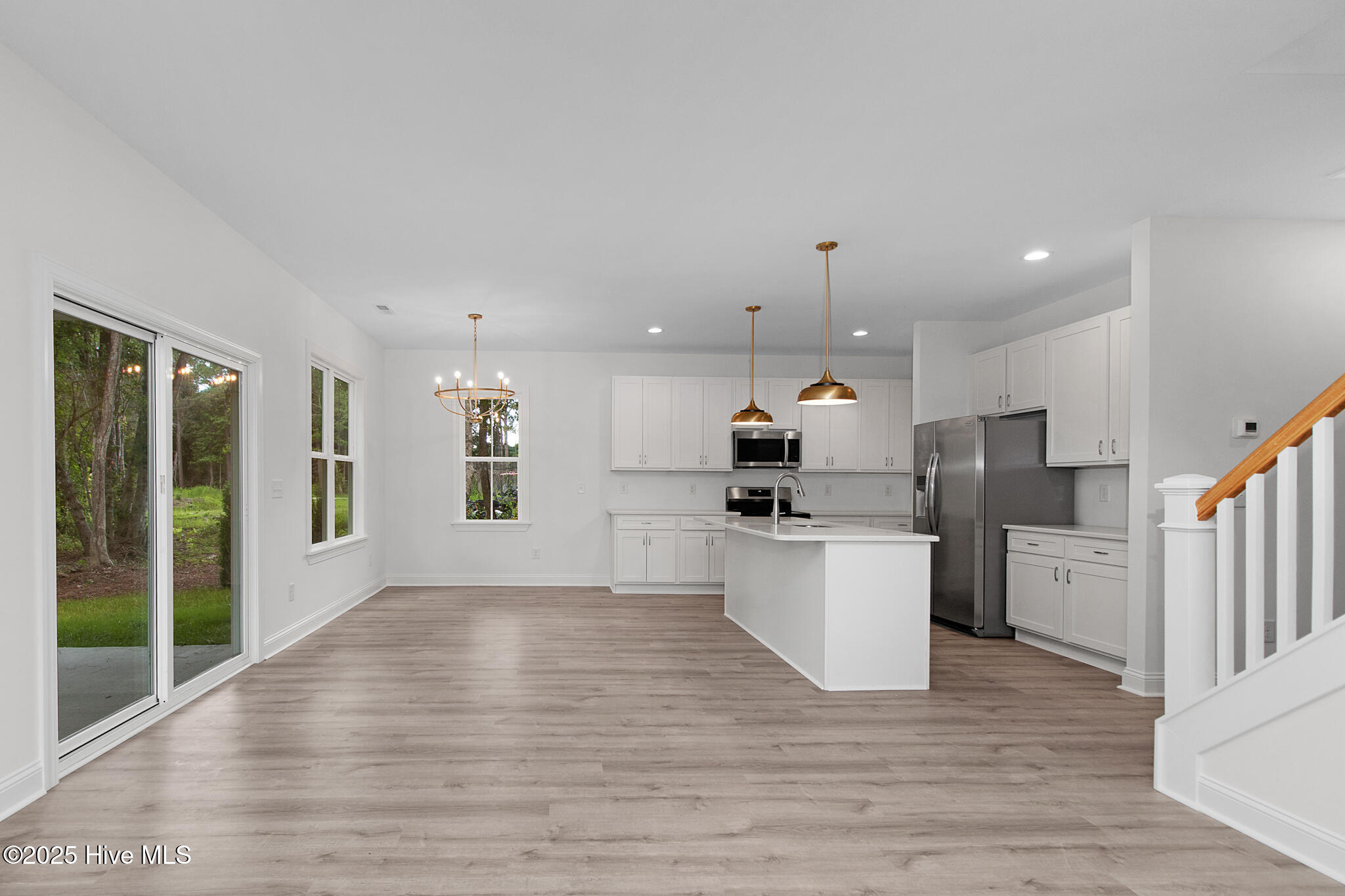 357 McCabe Road Morehead City, NC 28557 - Photo 9 of 30 Open concept kitchen, dining and living