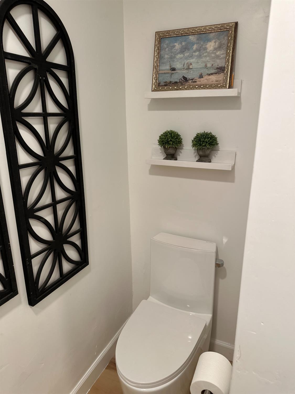 225 North Akers Road, Unit 308 Visalia, CA 93291 - Photo 18 of 72 a white toilet sitting next to a small window