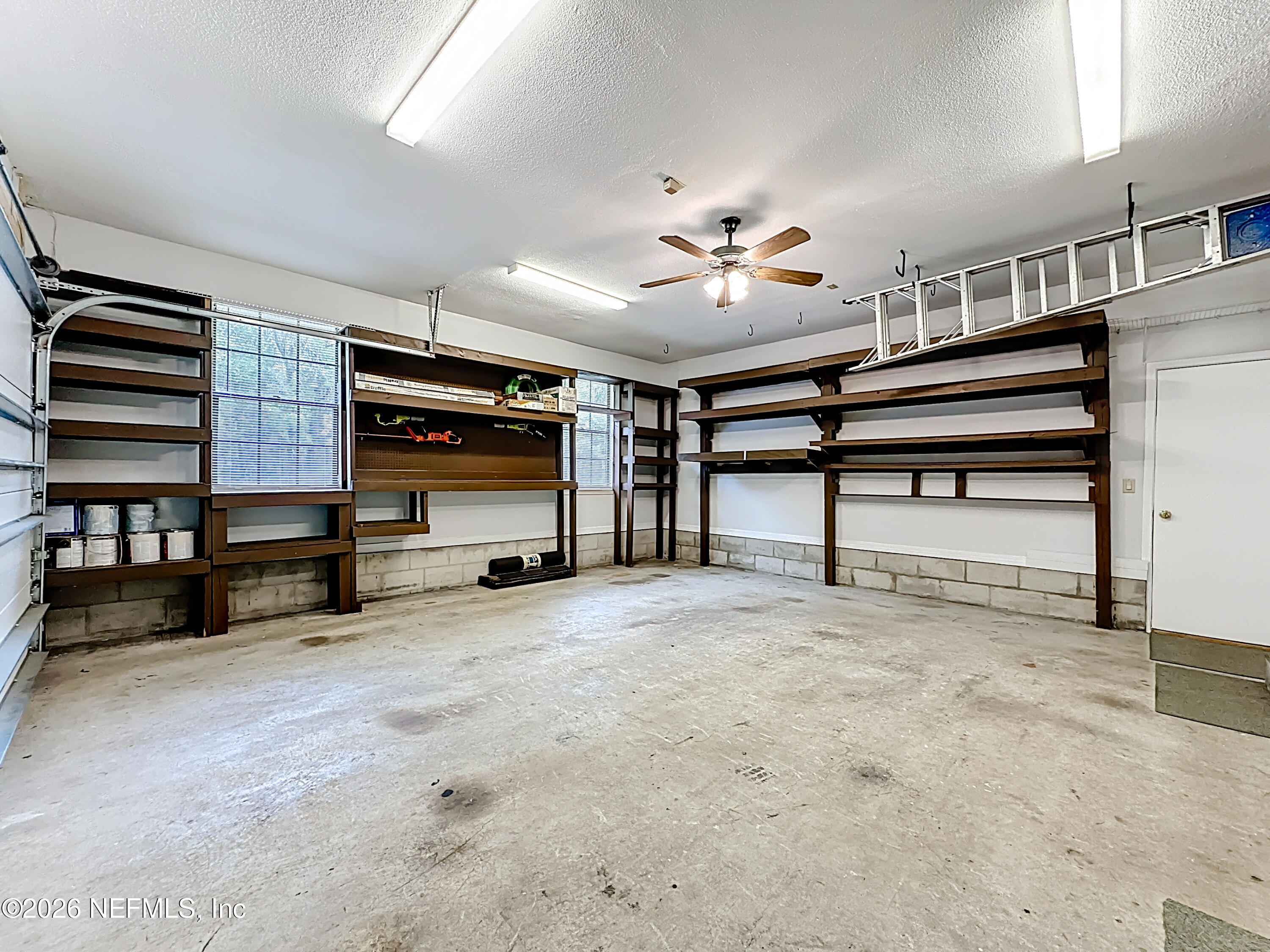10298 Lone Star Road Jacksonville, FL 32225 - Photo 31 of 42 a view of room with furniture and a ceiling fan