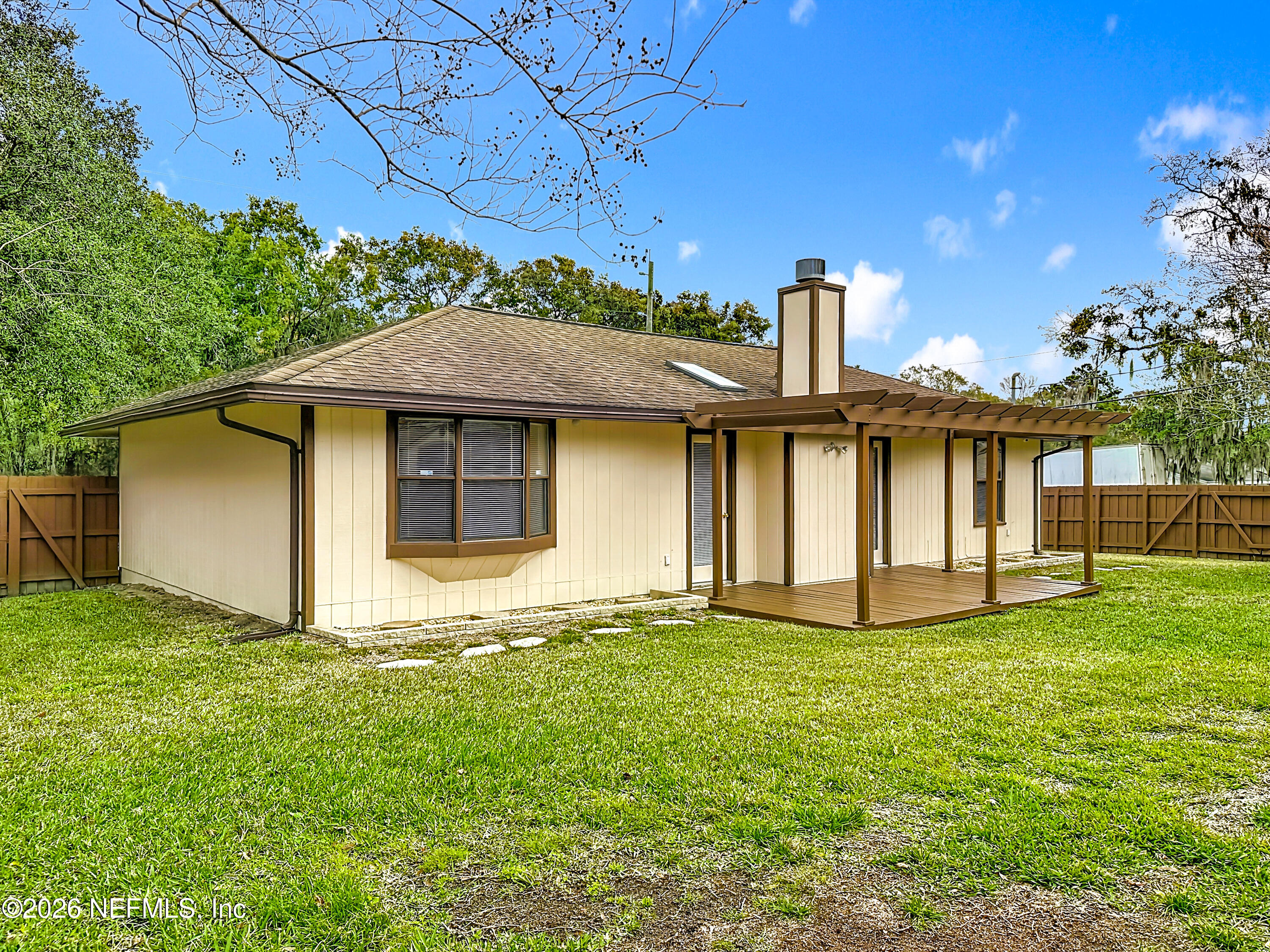 10298 Lone Star Road Jacksonville, FL 32225 - Photo 34 of 42 a front view of a house with a yard