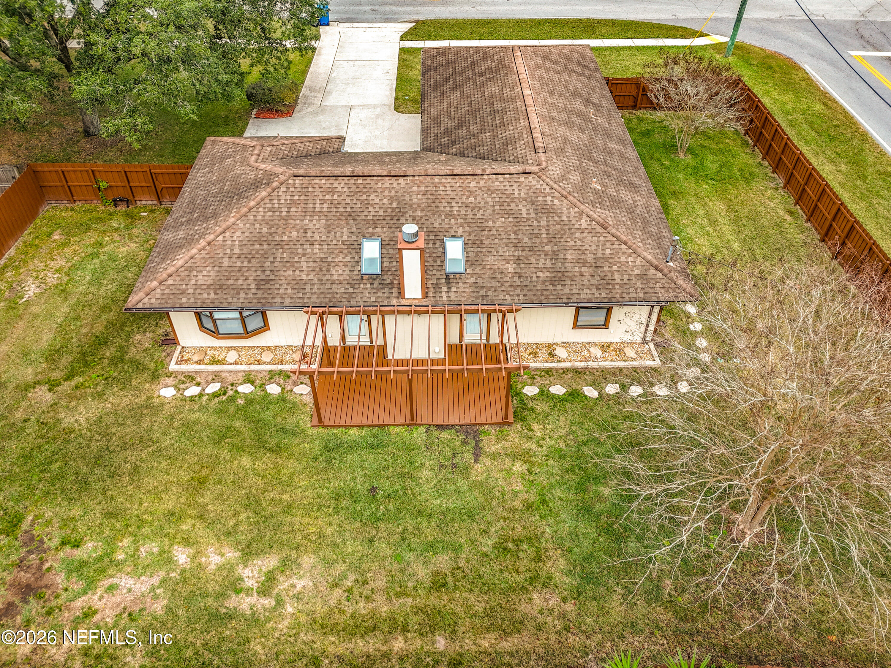 10298 Lone Star Road Jacksonville, FL 32225 - Photo 39 of 42 a view of a swimming pool with a garden