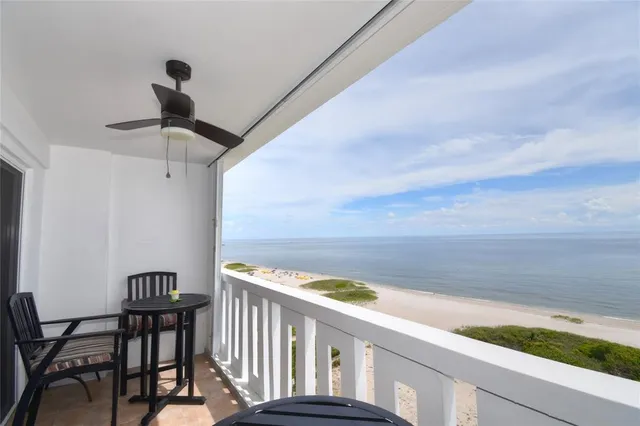 a view of staircase with a table