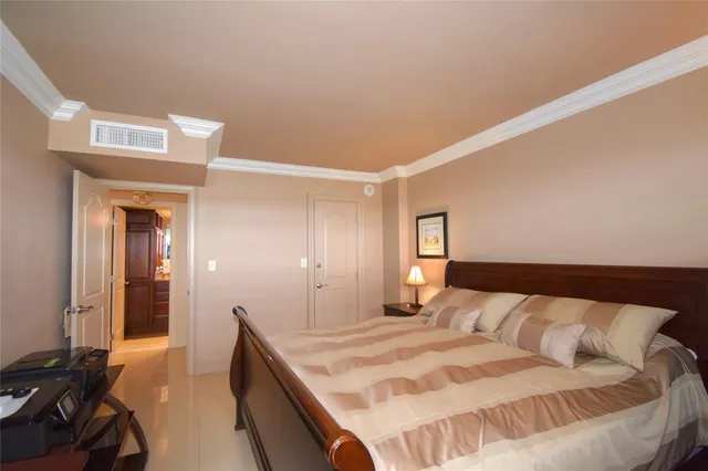 a bathroom with a granite countertop sink toilet a mirror and shower