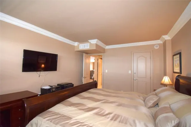 a bathroom with a sink mirror and vanity