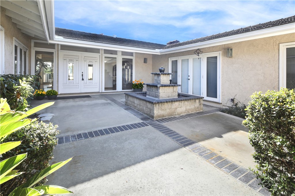 23262 Ellice Circle Dana Point, CA 92629 - Photo 2 of 10 a view of a house with backyard and porch