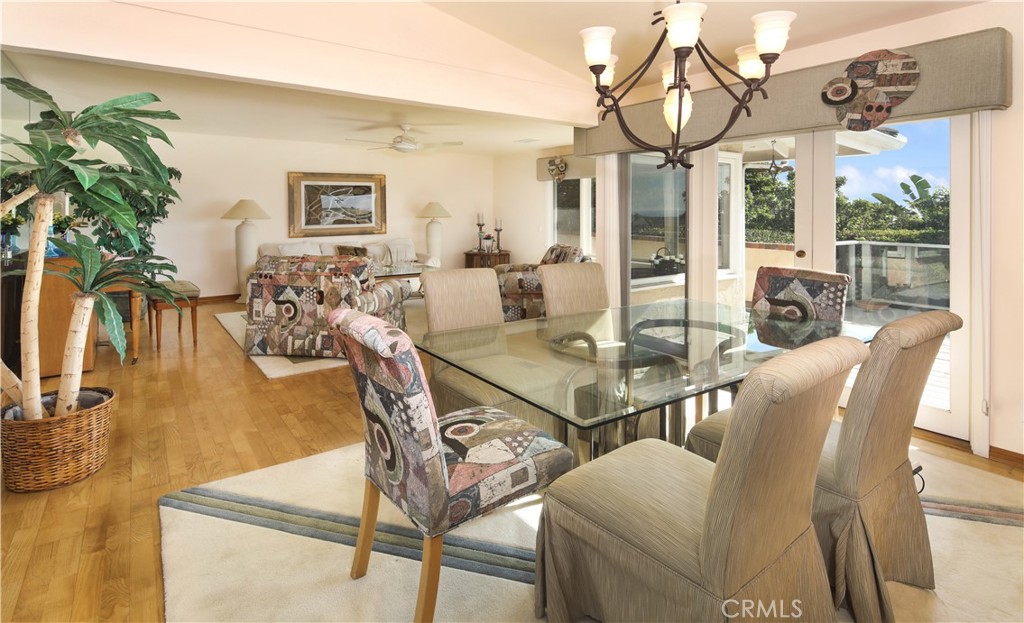 23262 Ellice Circle Dana Point, CA 92629 - Photo 4 of 10 a view of a dining room with furniture and wooden floor