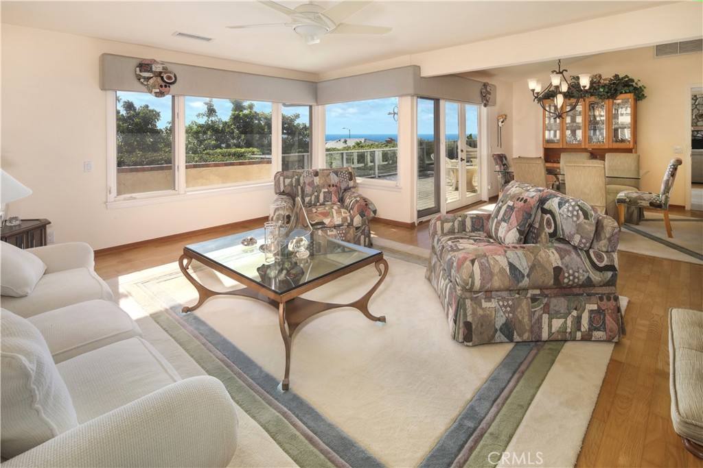 23262 Ellice Circle Dana Point, CA 92629 - Photo 5 of 10 a living room with furniture and a large window