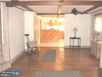 229 Ballymore Road Springfield, PA 19064 - Photo 7 of 12 a living room with furniture and a large window