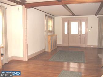 229 Ballymore Road Springfield, PA 19064 - Photo 8 of 12 a view of an empty room with a window