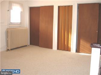 229 Ballymore Road Springfield, PA 19064 - Photo 10 of 12 a view of a room with a wooden floor