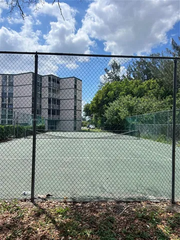 a view of a wooden fence