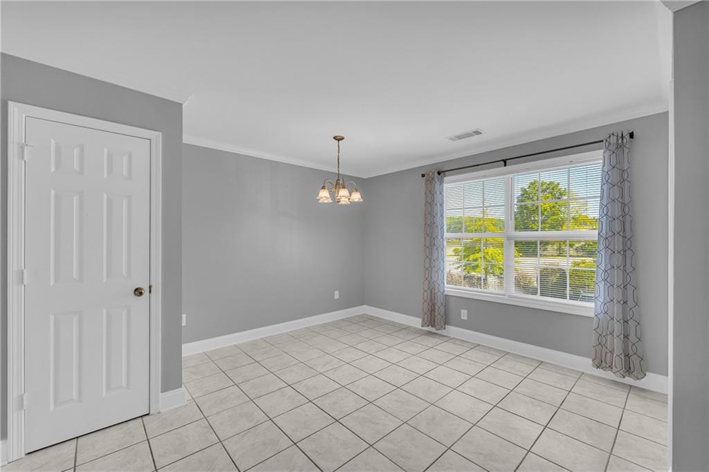 105 Whitehead Road, Unit 17 Athens, GA 30606 - Photo 14 of 38 a view of an empty room with a window
