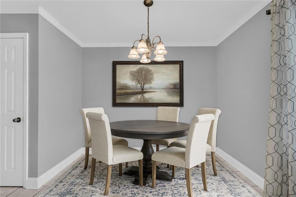 105 Whitehead Road, Unit 17 Athens, GA 30606 - Photo 19 of 38 a dining room with furniture and window