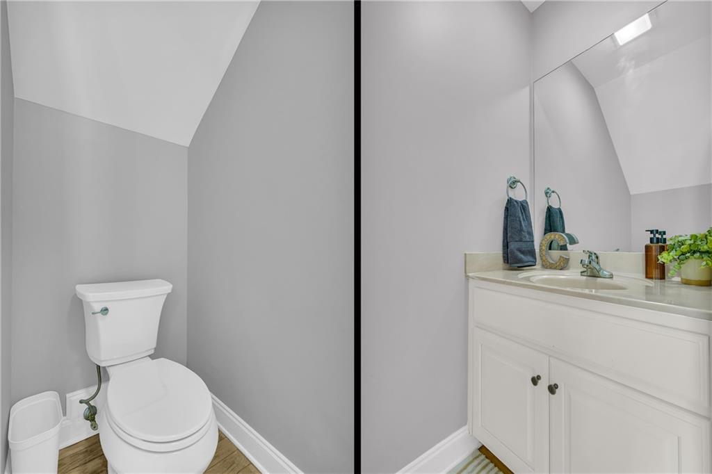 105 Whitehead Road, Unit 17 Athens, GA 30606 - Photo 22 of 38 a bathroom with a toilet a sink and mirror