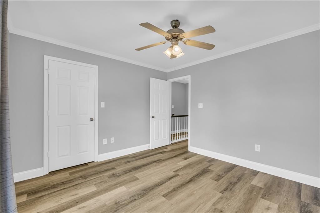 105 Whitehead Road, Unit 17 Athens, GA 30606 - Photo 26 of 38 a view of a livingroom with a ceiling fan